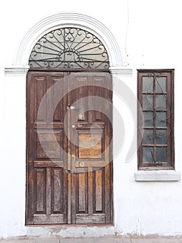 A weathered wooden door in Sucre