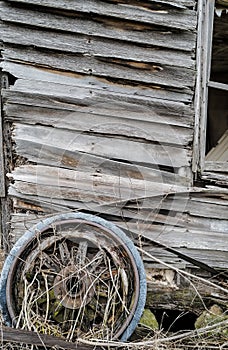 weathered wooden door and wall or abandoned farm shed