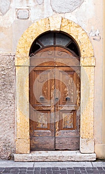 Weathered wooden doors in Italy