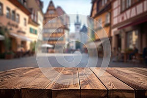 Weathered wooden product display with european old town on background on background