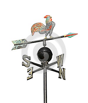 weathervane with rooster above an arrow and the four cardinal p