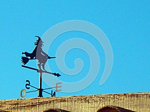 Weathervane in the shape of a witch to measure wind direction