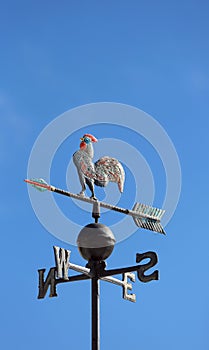 Weathervane to indicate the wind direction with a rooster in wro