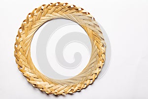 Weaved circular frame made from bamboo tree. Isolated in White background with copy space