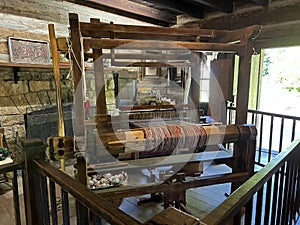 Weaverâs Loom Inside an 1800âs Recreated Home in Spring Mill State Park photo