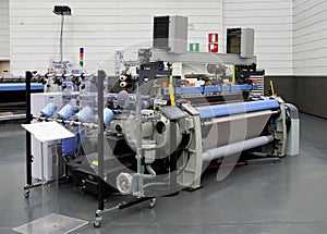 Weaving automatic machines - Weaving is a method of textile production in which two distinct sets of yarns or threads are