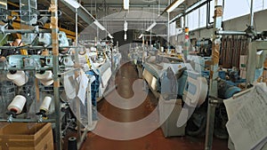 weaving factory workshop. Textile factory equipment. automated weaving looms. textile industry. fabric production