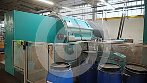 weaving factory workshop. thread coloring. automated process of coloring threads and yarn. Textile factory equipment