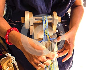 Weaving loom with inkle blu and yellow