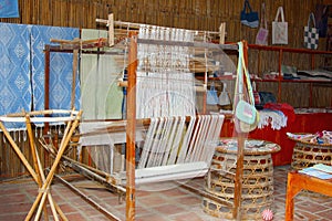 Weaving looms crafts inside house, North Vietnam photo
