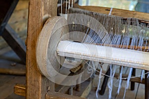 Weaving machine part mechanism, weaving thread, traditional production method