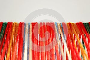 Weaving mini machine for making belts with patterns. Folk art, handmade. Detail.