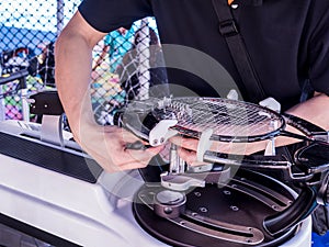 Weaving, Stringing badminton racket photo