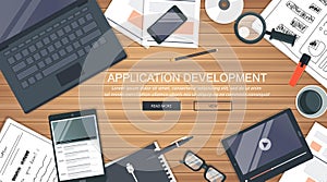 Mobile applications concept. Office desk with equipment. Application development concept. Flat