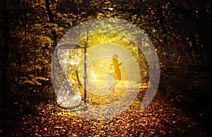 Magical hourglass and female guide in the enchanted forest, portal, divine timing