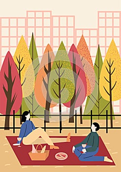 People spending time together in  autumn city park. Colorful trees with orange, red and green leaves in the background.