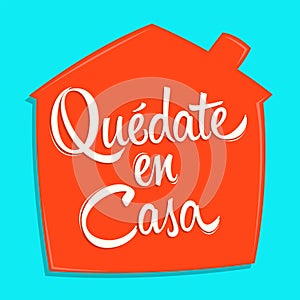 Quedate en Casa, Stay at Home spanish text vector design. photo