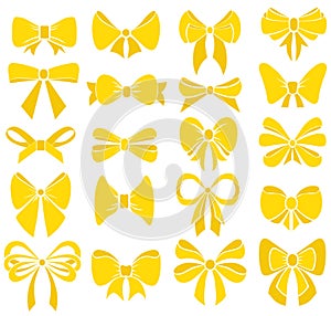 Set of graphical yellow bows. Vector sillouettes. photo