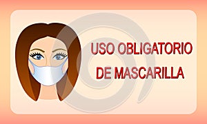 Spanish text: `Uso obligatorio de mascarilla`. Translation: Wearing mask required. photo