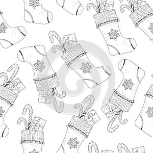 Cartoon Christmas New Year winter socking with snowflake and present sketch template seamless pattern. photo