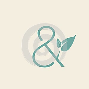 Ampersand logo. Decorative green leaf elements.