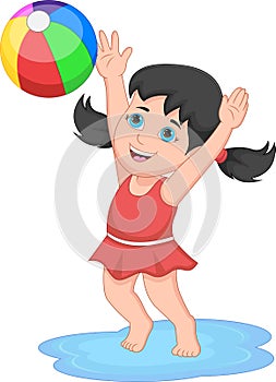 Little girl playing with inflatable ball