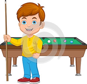 boy playing billiard