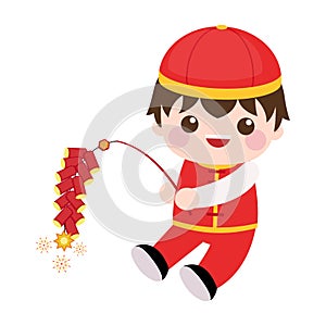 Cute boy playing with firecrackers to celebrate Chinese new year