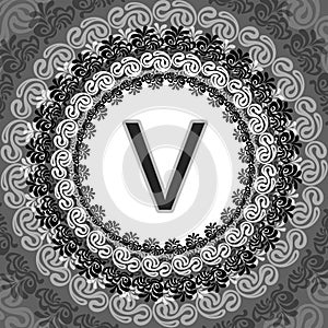 Stylized circular design featuring a bold letter 