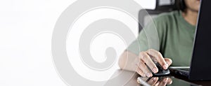 Web banner, business concept. Woman hand using the mouse of a computer using a laptop, panoramic banner