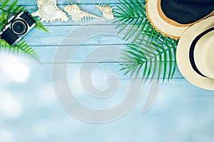 Web banner and flat lay summer time holiday and beach accessories on blue wooden background