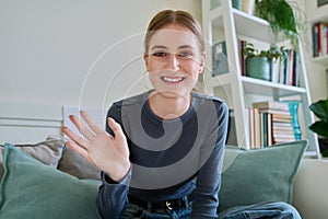 Web camera view of teenage girl talking looking in camera, online meeting, video call