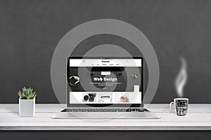 Web design agency presentation with responsive, flat web site design on laptop display