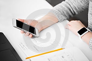 Web designer creating mobile user interface