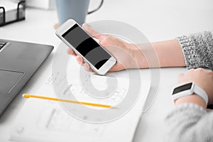 Web designer creating mobile user interface