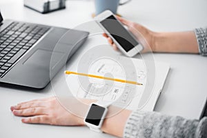 Web designer creating mobile user interface