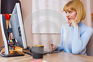 Web designer drawing using graphic board