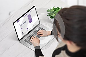 Web designer work on laptop computer on webpage layout concept