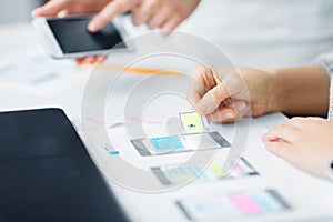 Web designers creating mobile user interface