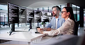 Web Developer Coding On Computer