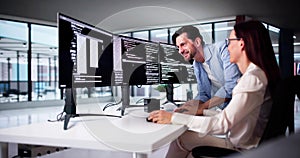 Web Developer Coding On Computer