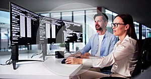 Web Developer Coding On Computer