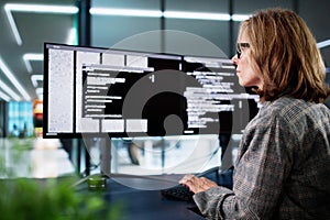 Web Developer Coding On Computer