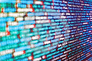 Web developer HTML code with CSS on screen. Application web source code on monitor. Program development concept. IT coding on