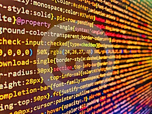 Web developer HTML code with CSS on screen. Programming on monitor background. Web abstract programming and crea. Javascript