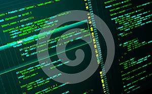 Web developing of the site using php language. Code on dark green background, macro