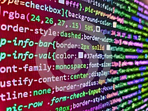 Web development code: CSSSASS styles preprocessor script lines. HTML5 in editor for website development. Programmer working in a