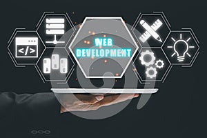 Business person using tablet with web development icon on vr screen