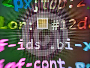 Web development concept. Program code PHP HTML CSS of site. Data encryption security code on a computer display, close up.