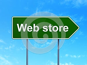 Web development concept: Web Store on road sign background